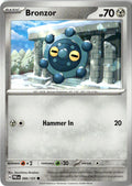 Front of Bronzor 066/131 from Prismatic Evolutions