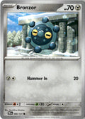 Front of Bronzor 066/131 from Prismatic Evolutions